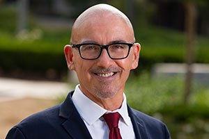 Peter with a graduate. 