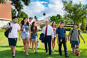 Peter with a graduate. 