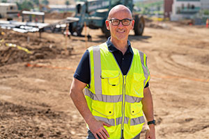 Peter with two students. 