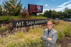 Peter with two students. 